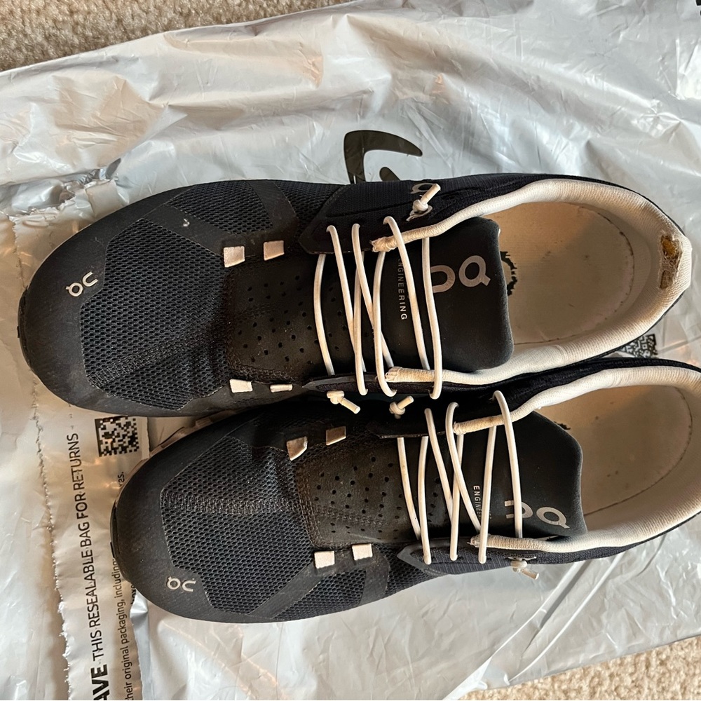 On Running Black and White Athletic Shoes